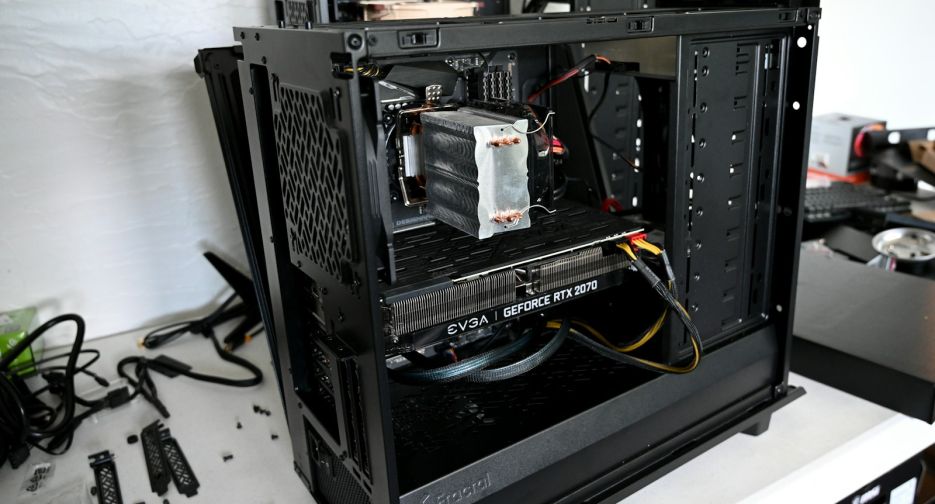 black computer tower on white table