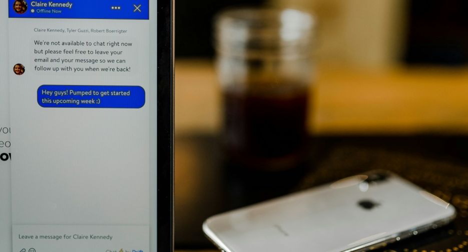 silver iPhone X on brown surface