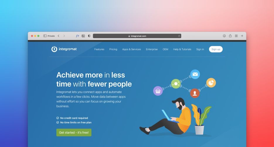 a person sitting on the floor using a laptop